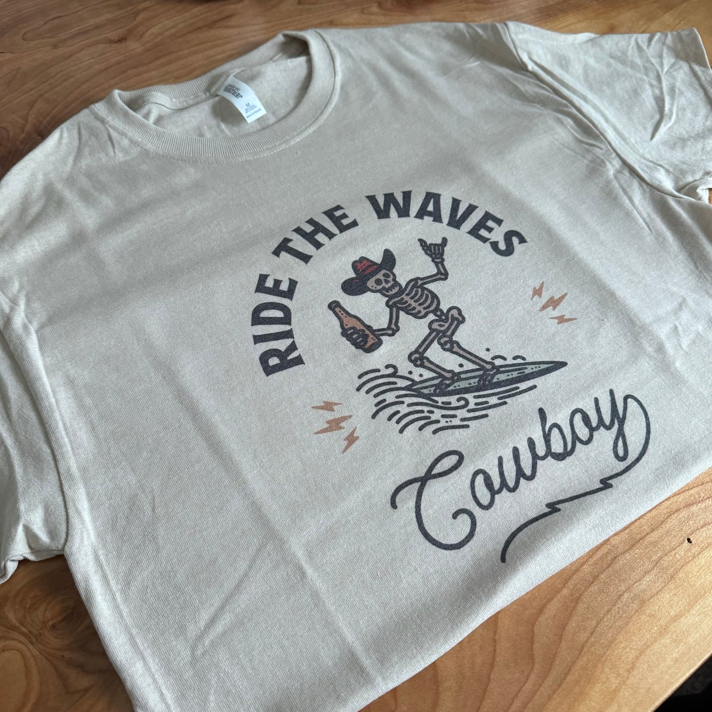 Ride the Waves Cowboy Western Coastal Graphic Tee